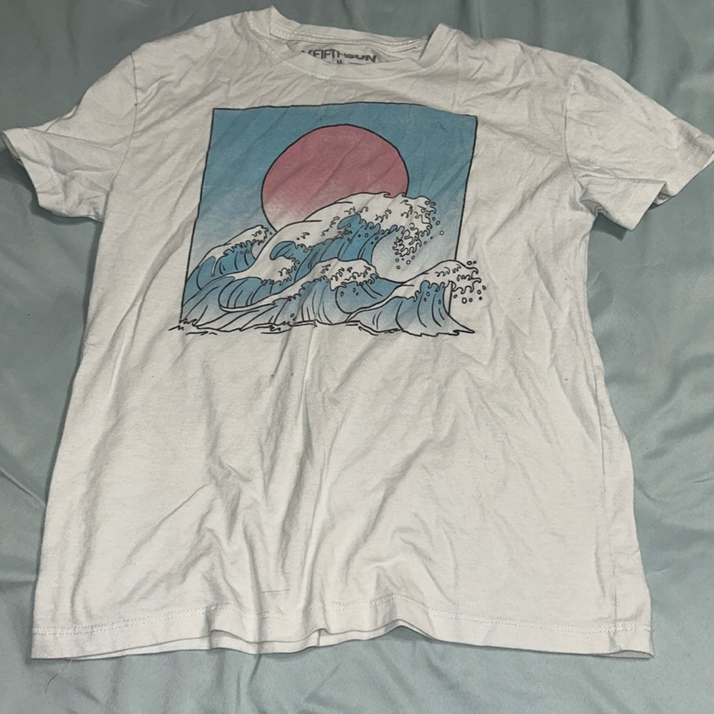 White shirt with an ocean on it